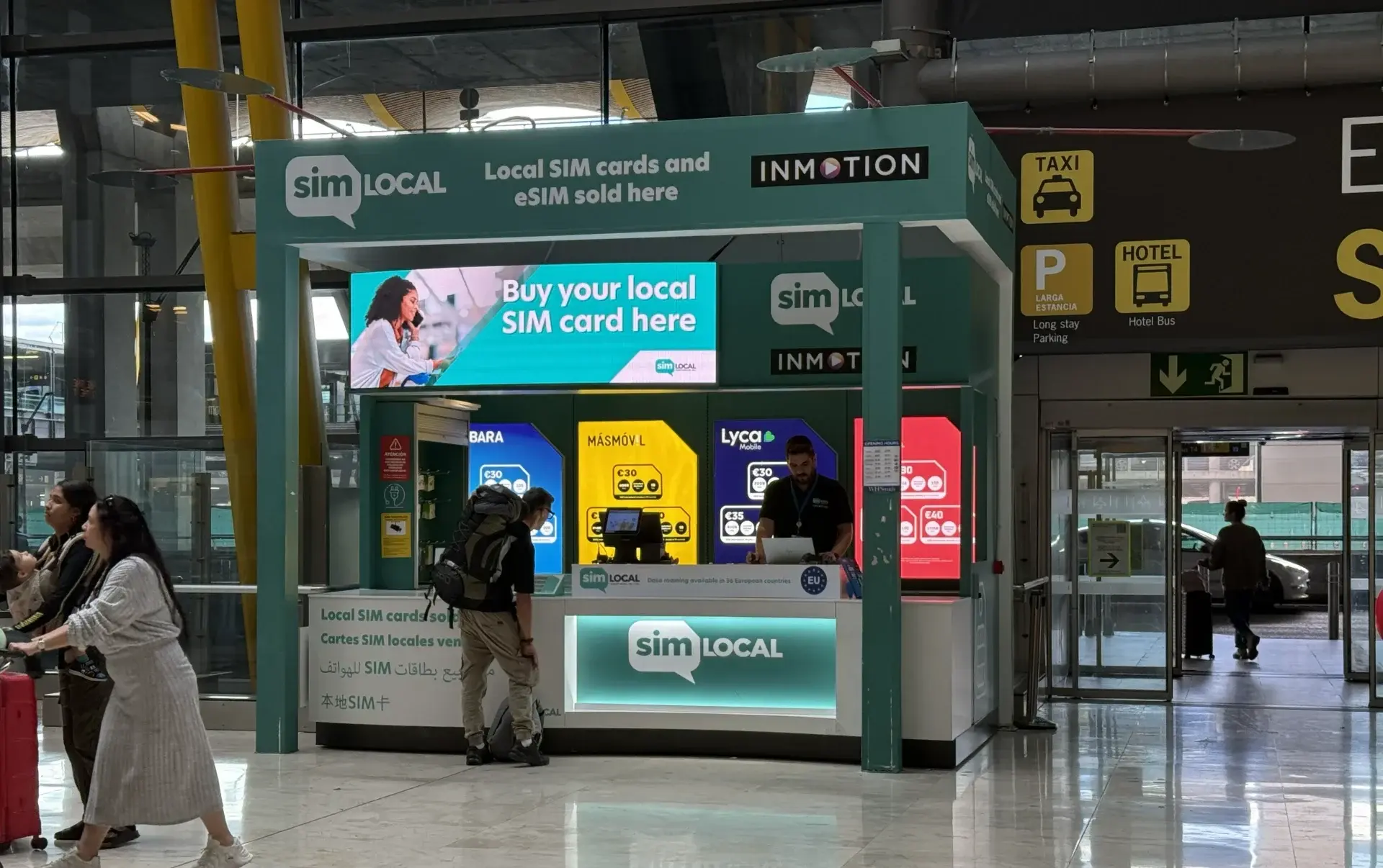 SIM Local store at Madrid Barajas Airport Terminal 4 arrivals, where travellers can buy local prepaid SIM cards from providers such as Lycamobile, MasMovil and LEBARA