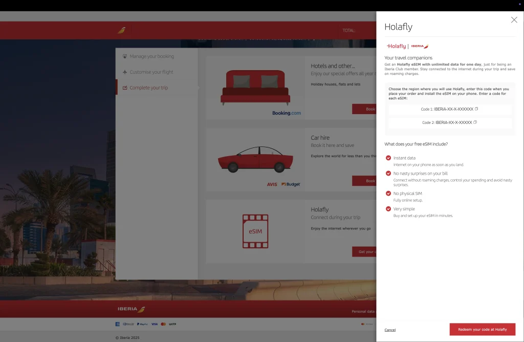 A pop-up window on the Iberia website titled 'Holafly' showing promotional codes for a free eSIM with unlimited data for one day and a red 'Redeem your code at Holafly' button.